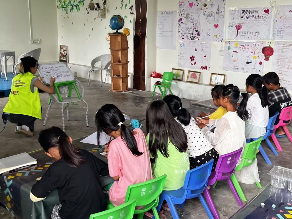 Providing childcare to multiethnic children including from transnational families in Ruili, Jully 2023. Credit: Yiran Tian