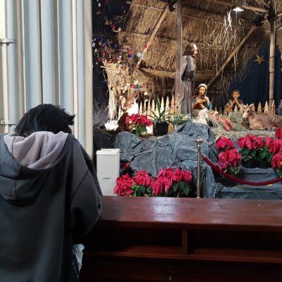 A man praying at Jakarta Cathedral.