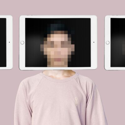 Multiple blurred person face on tablet screen, covering true identity. Credit: Collagery/Shutterstock.