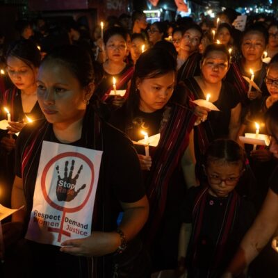 Demonstrators carry out a candle light protest over sexual assault case of two Kuki community women, in Manipur, on July 26, 2023 in Guwahati, India. Credit: Talukdar David/Shutterstock.