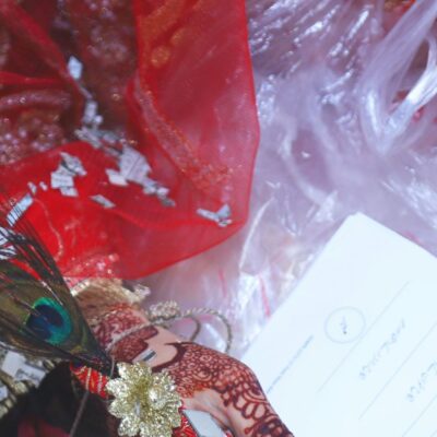 A bride signing marriage documents.