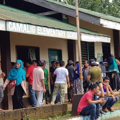 Voters in Marantao, Bangsamoro, gather outside a polling precinct 2019.
